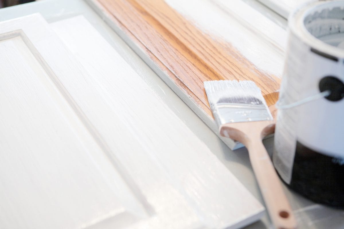 Applying Primer to Kitchen Cabinets | All Climate Painting and Remodeling