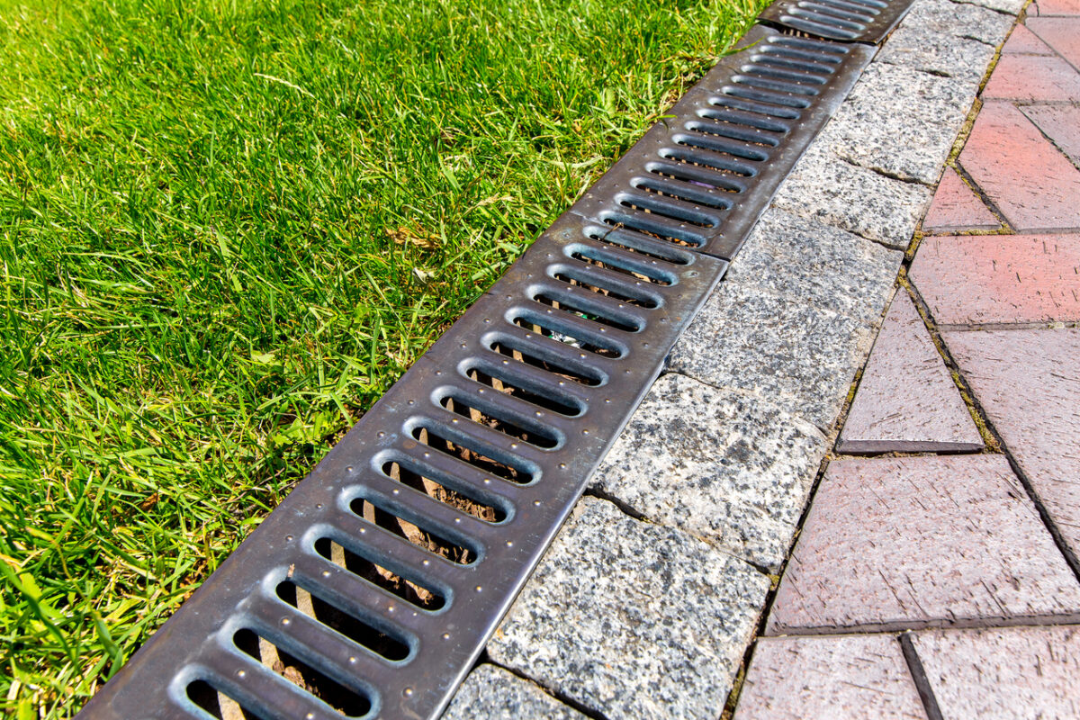 What is the Purpose of a Trench Drain System? - All Climate Painting